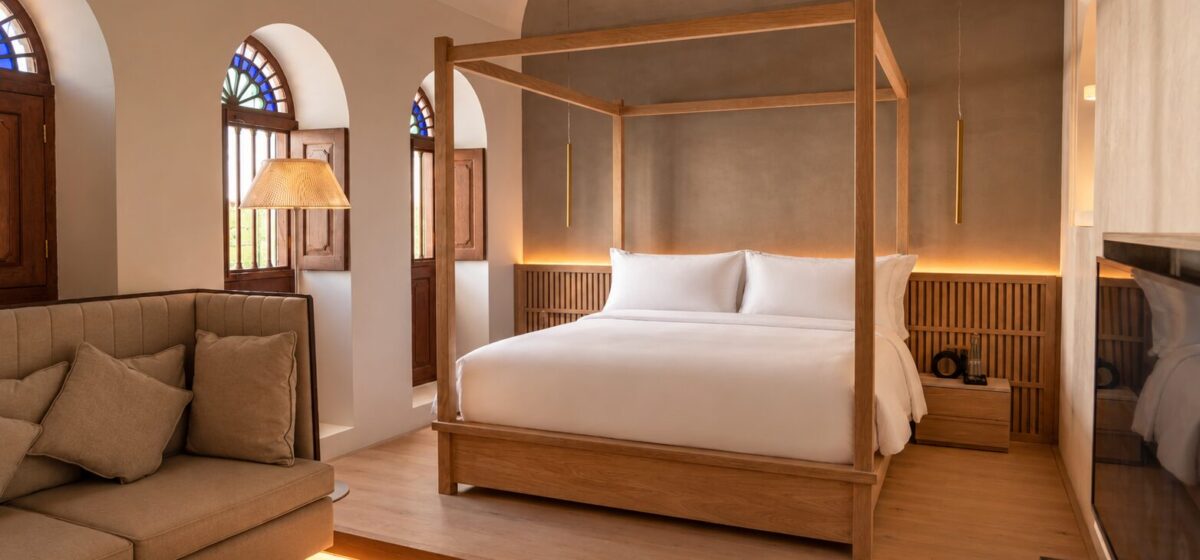 Warm Minimalist Four Poster Bedroom